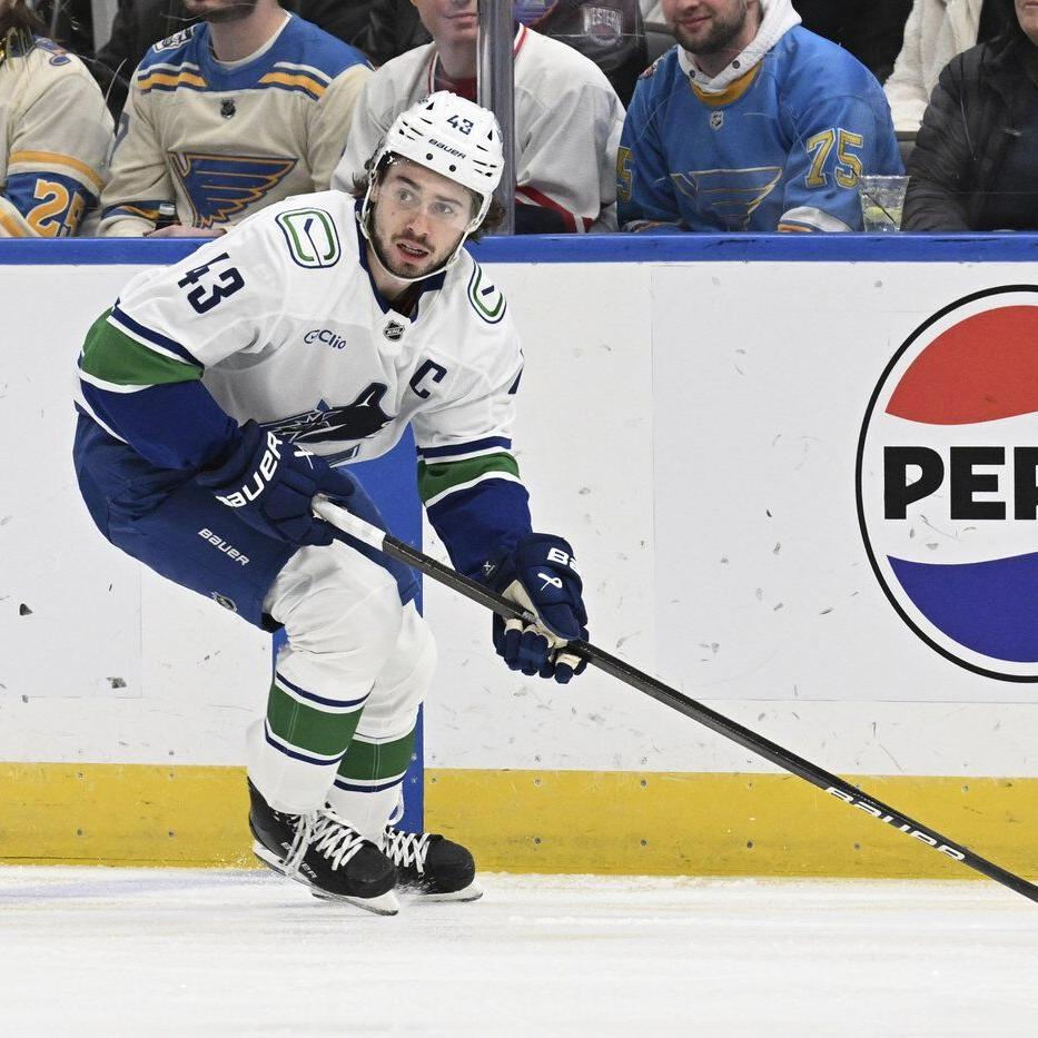 Canucks star defenceman Hughes misses game against Red Wings with injury